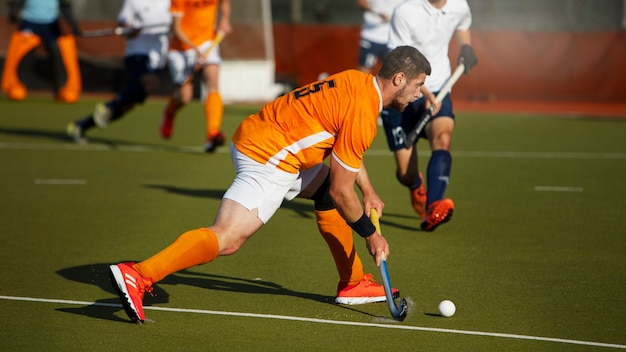 Photo field hockey players during a tournament game