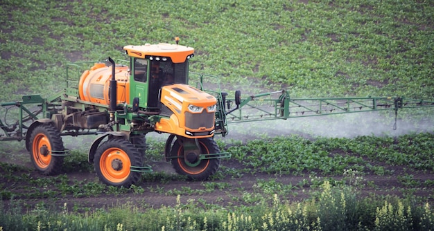 Field Nourishment A Tractor Sprayer Enriches the Crop Landscape