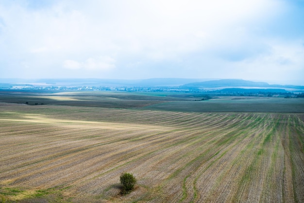 A field with a view of the city of kars.