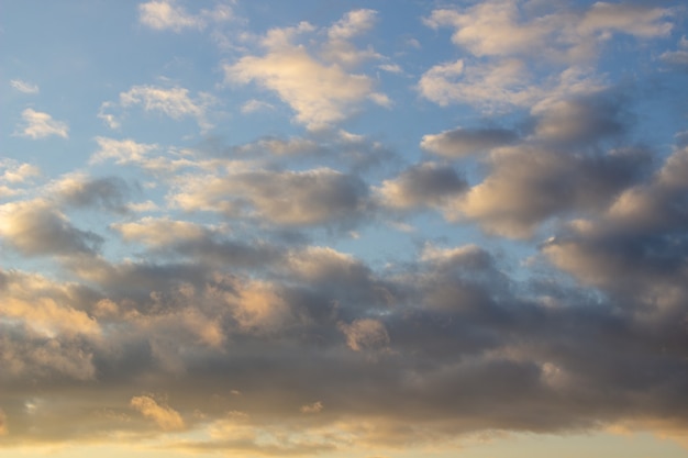 A fiery orange sunset sky. Beautiful sky with clouds.