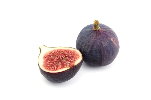 Fig fruit with ripe red half isolated on white background