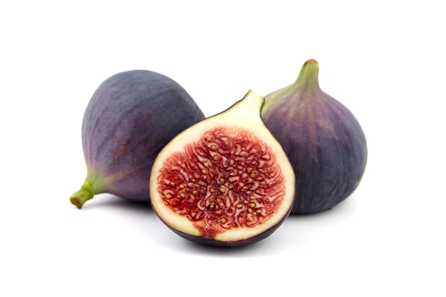 Fig fruit with ripe red half isolated on white background