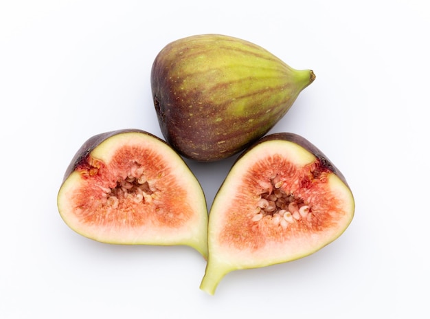 Fig fruits isolated on white background. Top view. Flat lay pattern