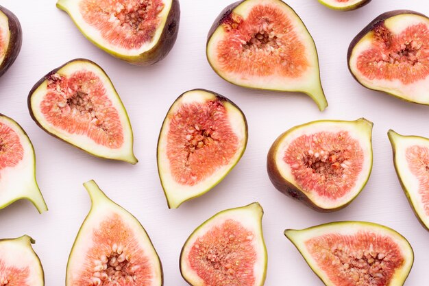 Fig fruits isolated on white. Top view. Flat lay pattern