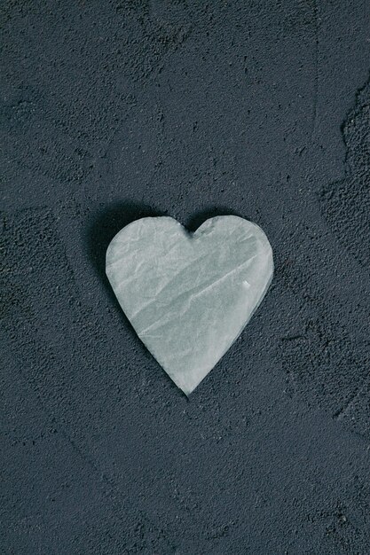 Figure in the form of a heart on a concrete background