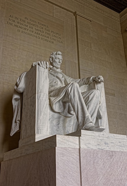 Figure of the president Abraham Lincoln is situated in the capital of the United States, Washington D.C. The monument is made from the marble and is 19 feet 5.8 m tall.