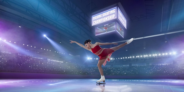 Figure skating girl in ice arena