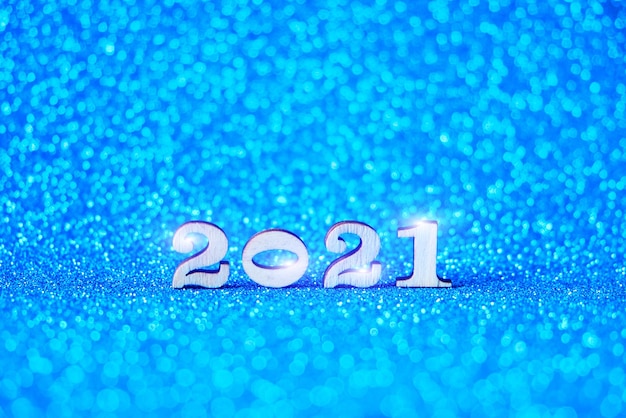 Figures for 2021 on a blue background.Coming new year.