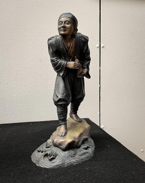 figurine (sculpture) of a japanese man