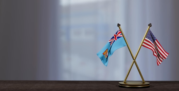 Fiji and USA flags on table Negotiation