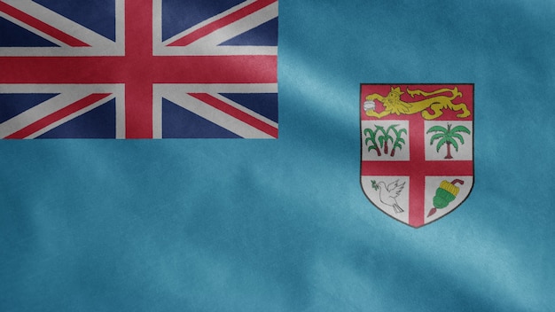 Fijian flag waving in the wind. Close up of Fiji banner blowing, soft and smooth silk.