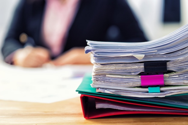 files and binder on the desk