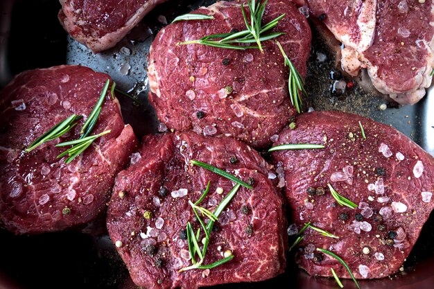 filet mignon beaf steak, raw butcher meat top view. fresh tenderloin cut