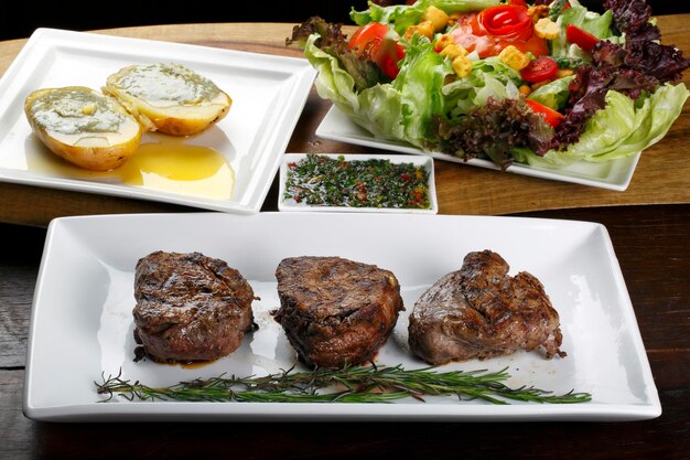 Filet mignon with salad and potato