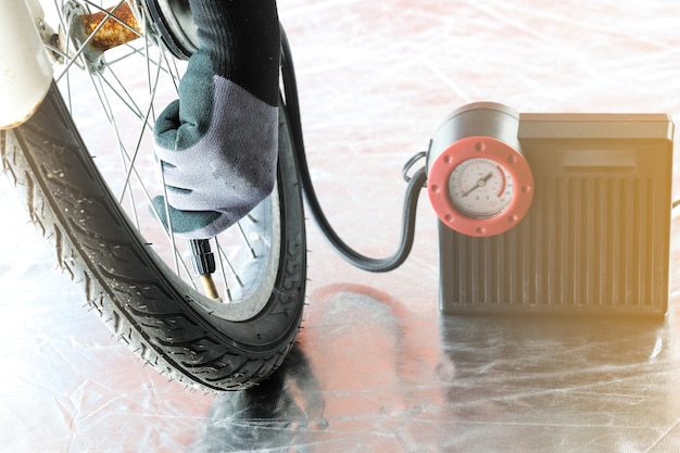 fill up pressure air to the tyre of bicycle