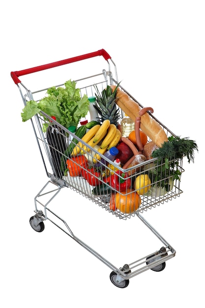 Filled with food shopping trolley isolated on white.