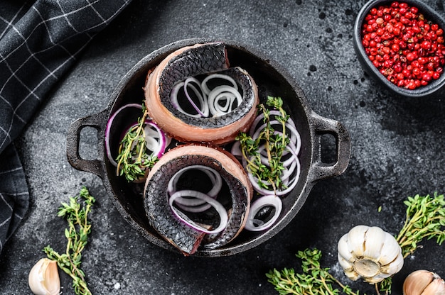 Fillet of Pickled herring with onion and thyme