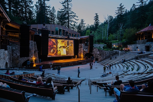 A film screening at an outdoor amphitheater with d generative ai