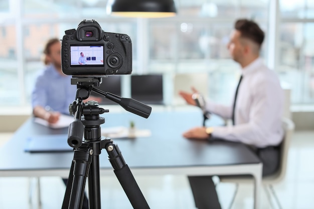 Filming of job interview with applicant in office