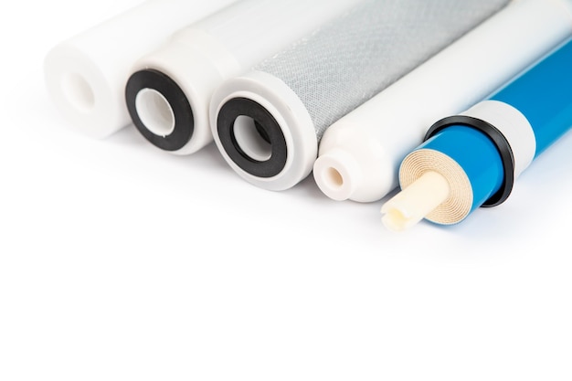 Photo filter cartridges for water on a bright blue background