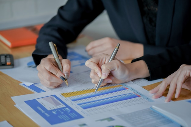 The financial audit team is checking the numerical graph to present the final step.