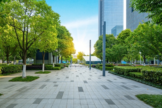 Colored pencil benches are pictured at a square amongst office buildings in  Guangzhou city, south China's Guangdong province, 23 June 2019. A square  amongst a cluster of high-rise office buildings in China's