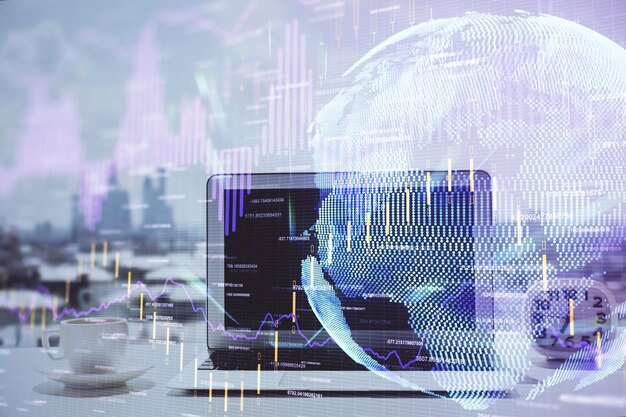 Photo financial chart drawing and table with computer on background multi exposure concept of international markets