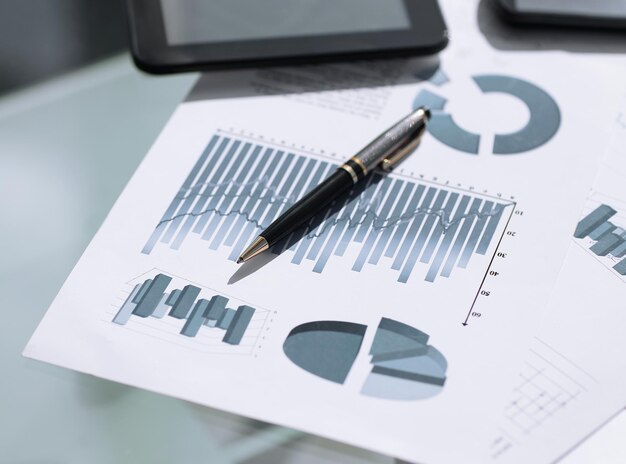 Financial charts and graphs on the table