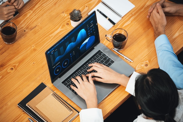 Photo financial data analysis dashboard by fintech bi or business intelligence display on laptop screen to indepth financial data analysis by business people working on business marketing meticulous