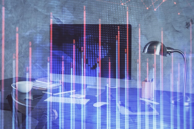 Financial graph colorful drawing and table with computer on background Double exposure Concept of international markets