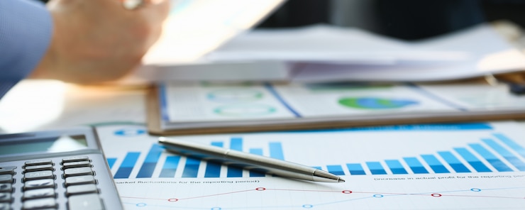 Photo financial statistics documents ball pen