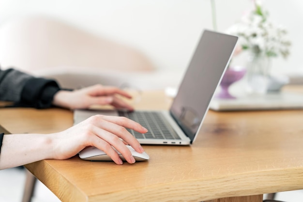 The financier uses a laptop Works surfing the Internet online site for analytics