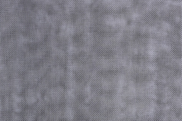 Foto fondo strutturato della maglia di nylon di plastica fine