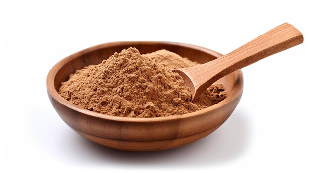 Photo finely dried cinnamon powder in a wooden bowl