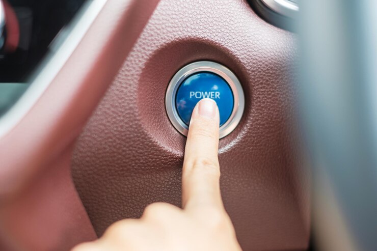 Premium Photo  Finger press a car ignition button or start engine 