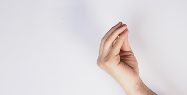 The finger purse or pinched fingers gestureItalian hand sign