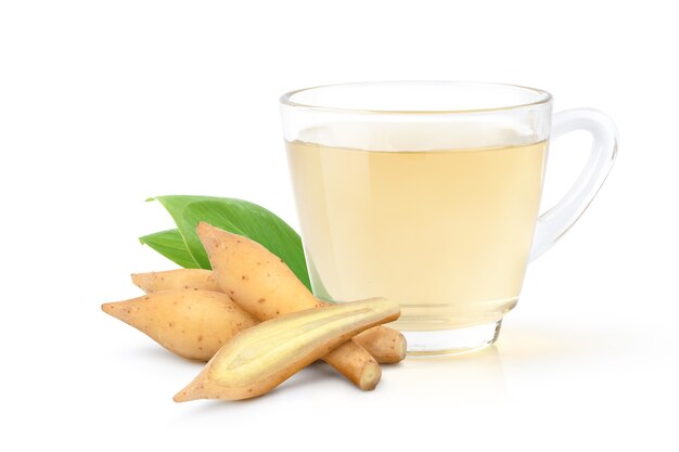 Finger root herbal beverage with fresh rhizome isolated on white background.