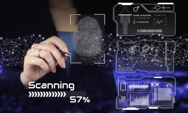 Fingerprint scanning of biometric identity and approval. hand
holding digital graphic pen and drawing digital hologram
fingerprint sign and collage with data charts on virtual
screen.