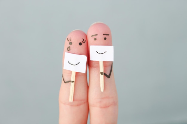 Fingers art of couple. concept of people hiding emotions.