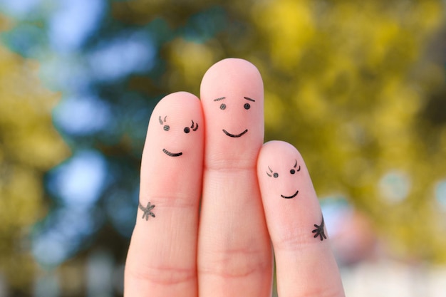 Fingers art of happy family The concept of a walk in the autumn park