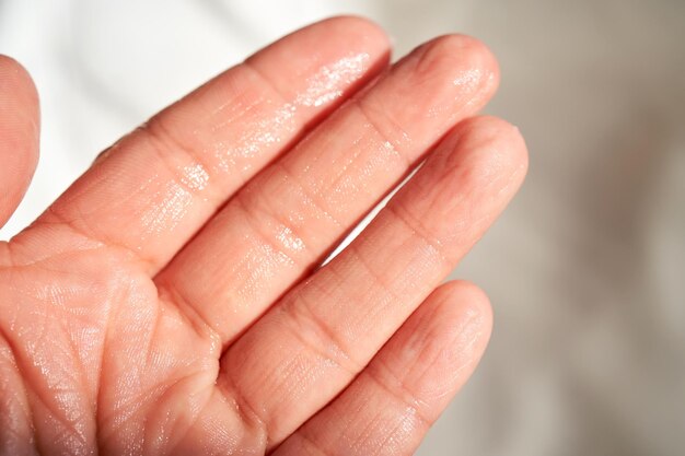 Fingers of the hand after moisturizer