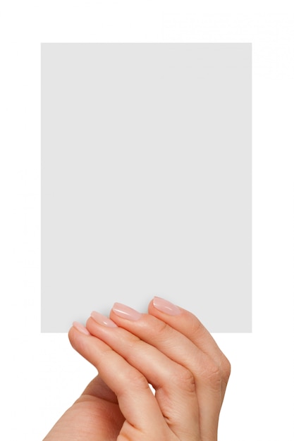 Fingers holding a blank white card