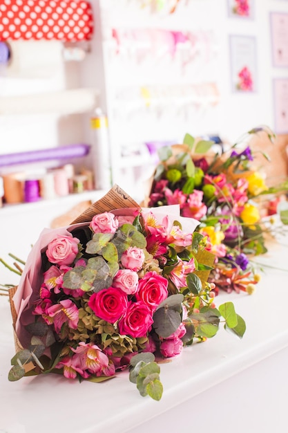 Finished bouquets on the table in the flower shop