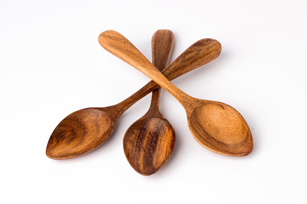 Finished three Wooden spoon isolated on white background