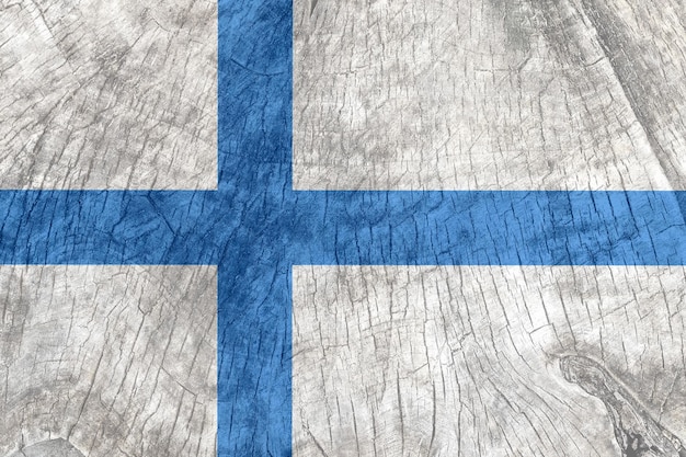 Флаг Финляндии на старой деревянной поверхности