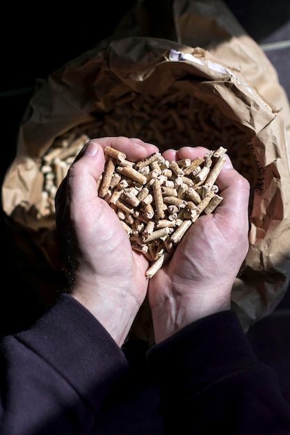 Fir pellet kraft bag with hands