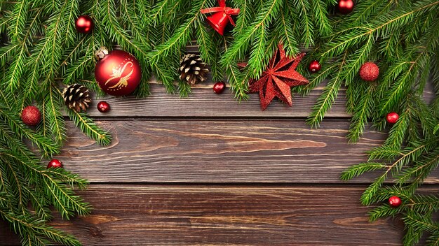 Fir tree branches with christmas decorations