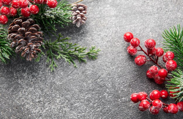 Fir Tree Decorations On Black Concrete With Copy Space