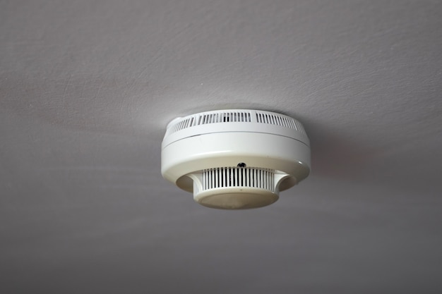 Fire alarm system on the ceiling. Smoke detector on the ceiling.