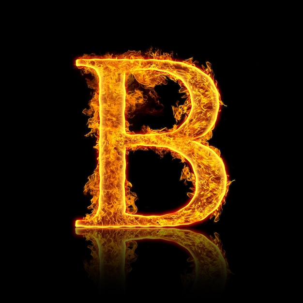 写真 黒の背景に分離された火のアルファベット文字b。